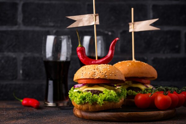 Burger and cheeseburger with tomato