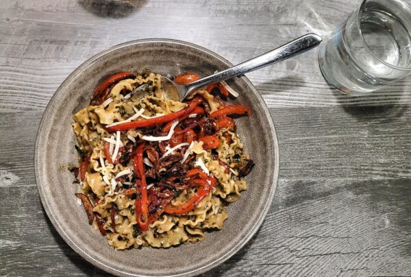 Overhead flat lay healthy food in a restaurant on neutral gray background in restaurant.
